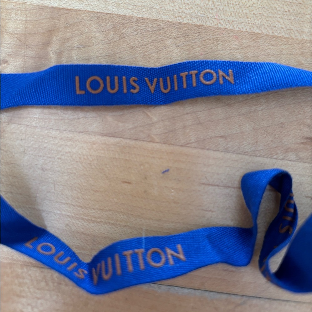 Two Louis Vuitton ribbons